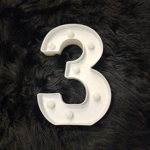 White Number 3 Plastic Light. Sits on a shelf or hangs on wall!